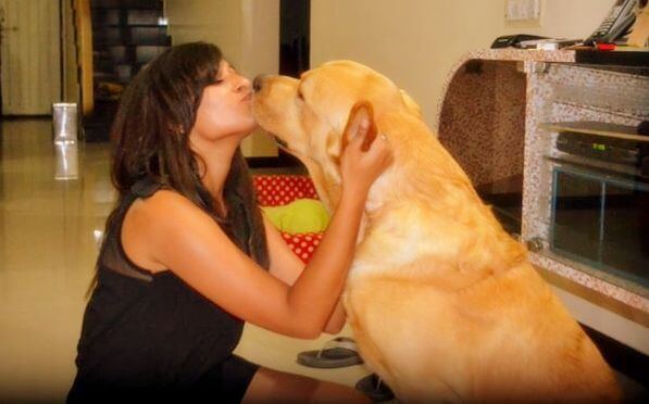 dog kissing girl India