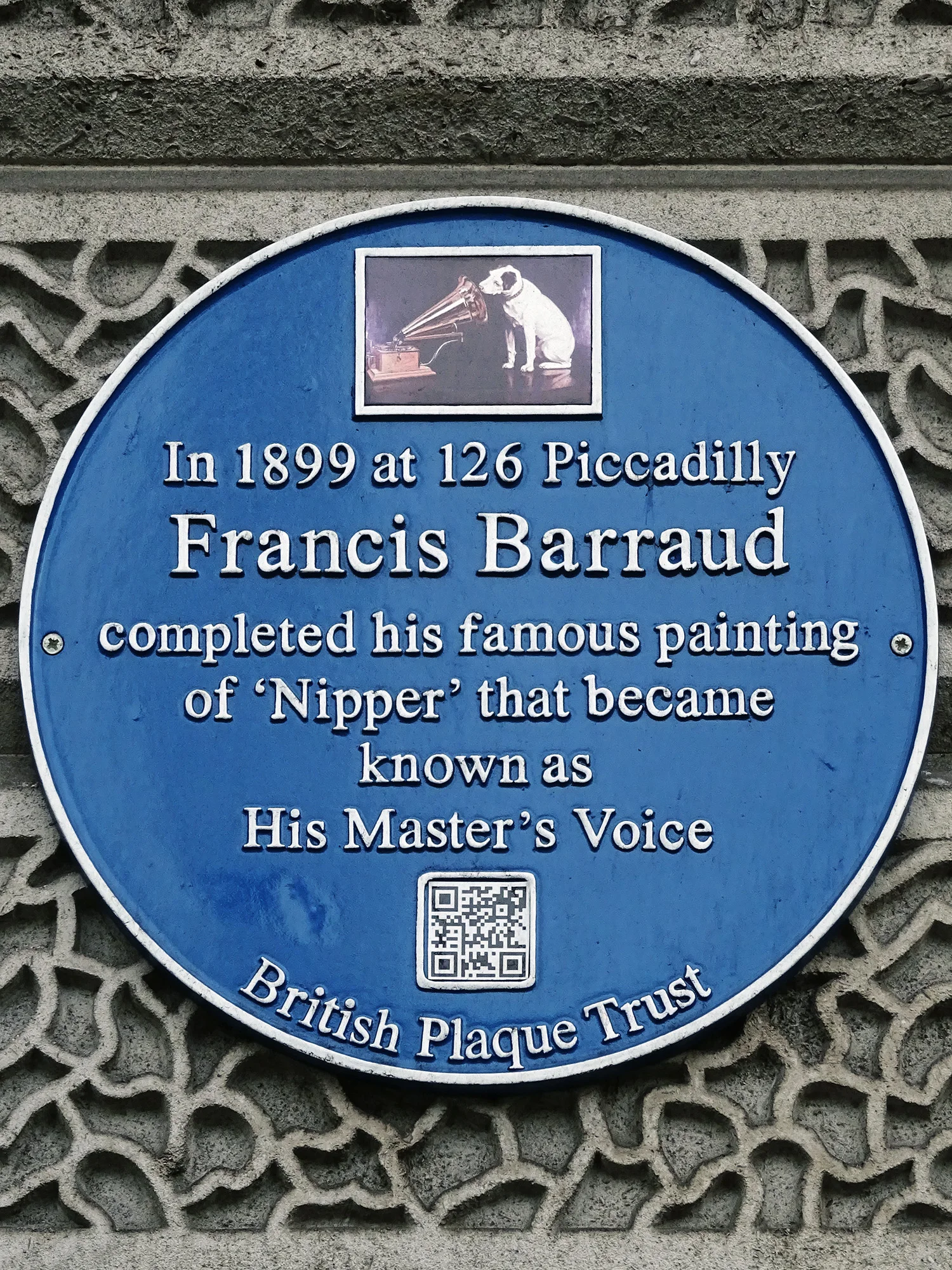 Blue heritage plaque for artist Francis Barraud, creator of the Nipper HMV dog painting, at 126 Piccadilly in London
